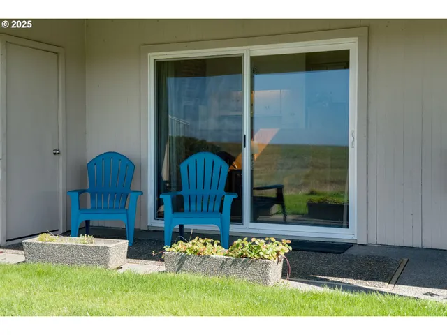 a room with furniture and a window
