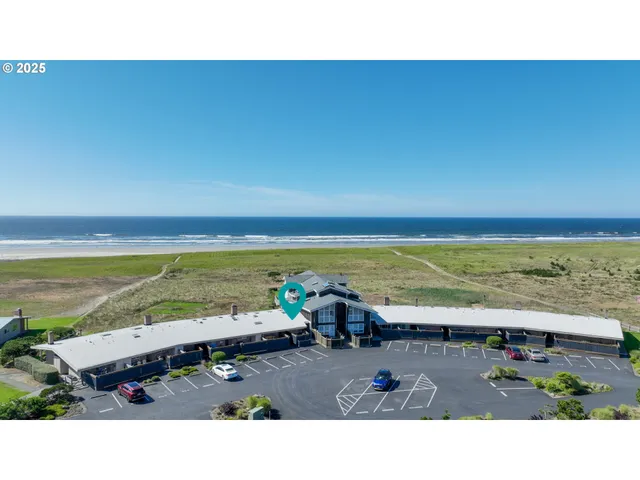 a view of a living room with furniture