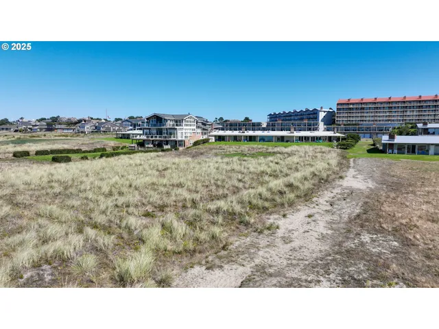 a view of a lake with a yard