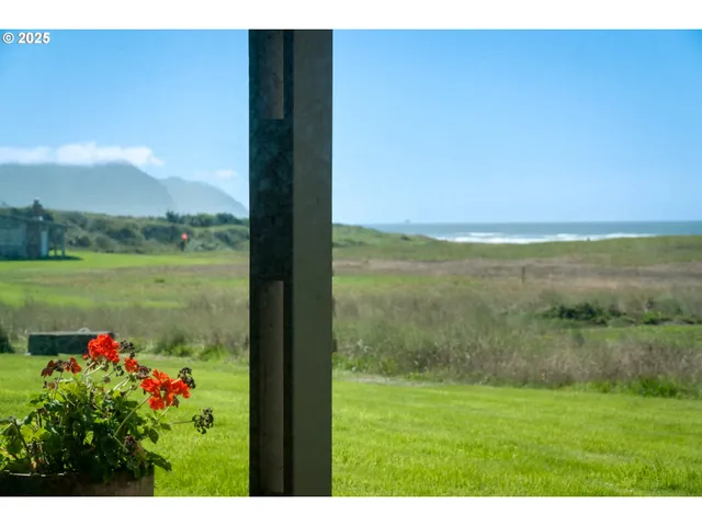 a view of a lake with a yard