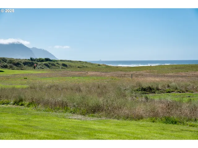 a view of a lake with a big yard