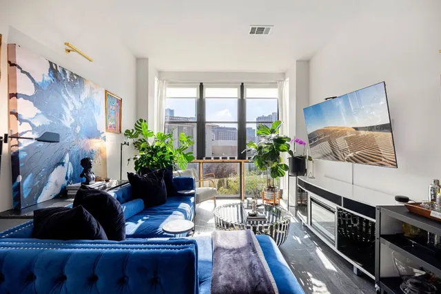 a kitchen with a table and chairs