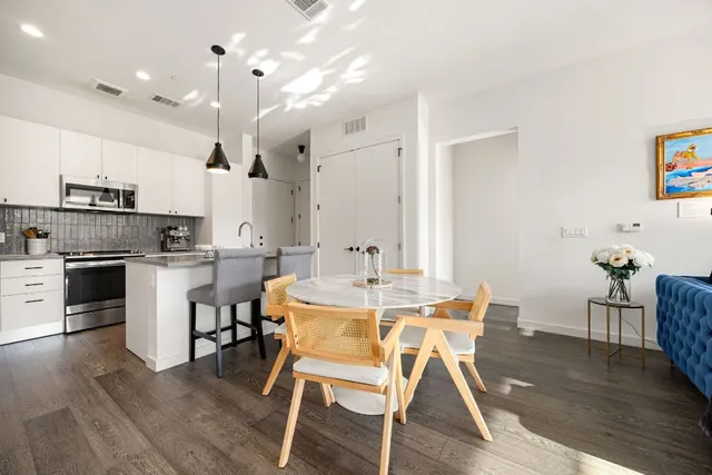 a view of a bathroom with a tub and window