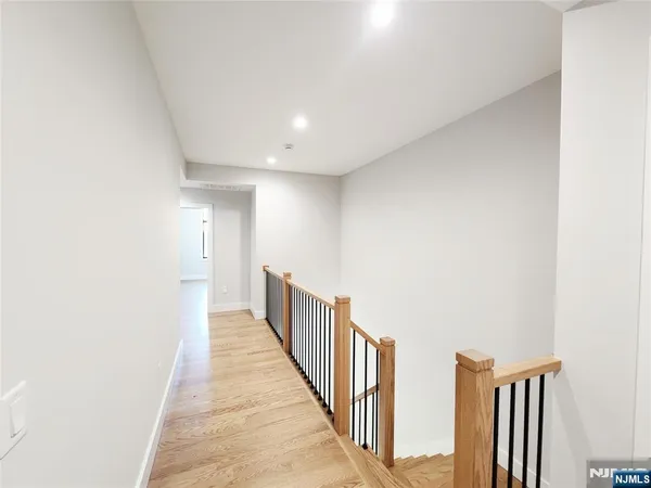 a view of hallway with stairs