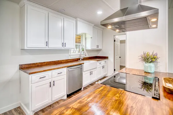 wooden floor with white walls