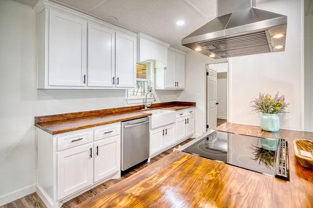 wooden floor with white walls