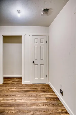 a kitchen with stainless steel appliances a stove and more cabinets