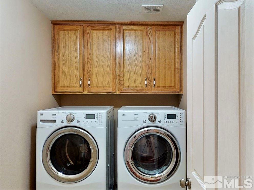 11210 Messina Way Reno, NV 89521 - Photo 24 of 29 a utility room with dryer and washer