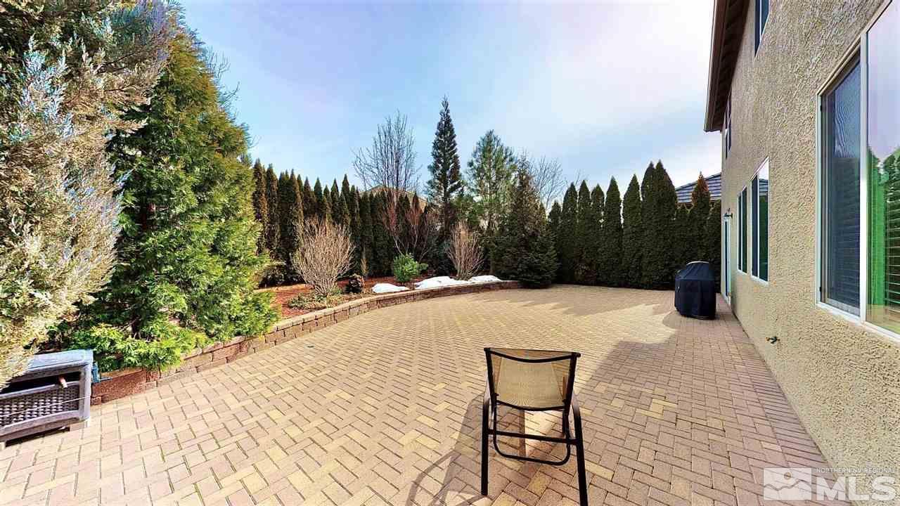 11210 Messina Way Reno, NV 89521 - Photo 27 of 29 a view of swimming pool with a lounge chair