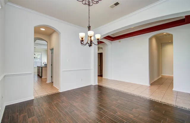 a view of a livingroom with wooden floor