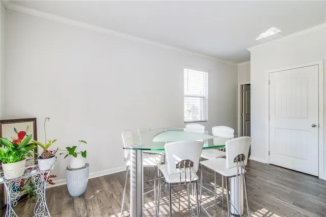 a bedroom with a bed and a chair