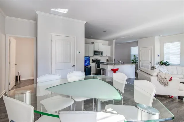 a bathroom with a bathtub and a sink