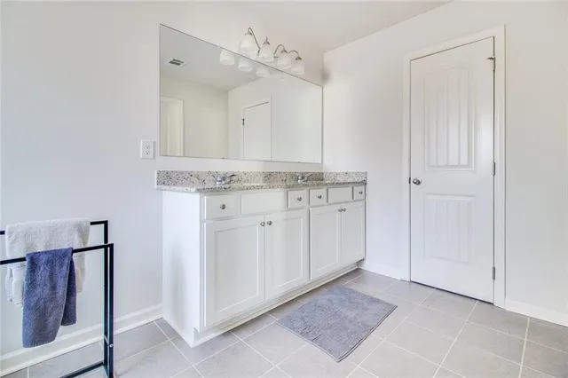 a room with furniture and a flat screen tv