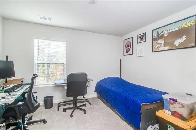 a view of a building with a street