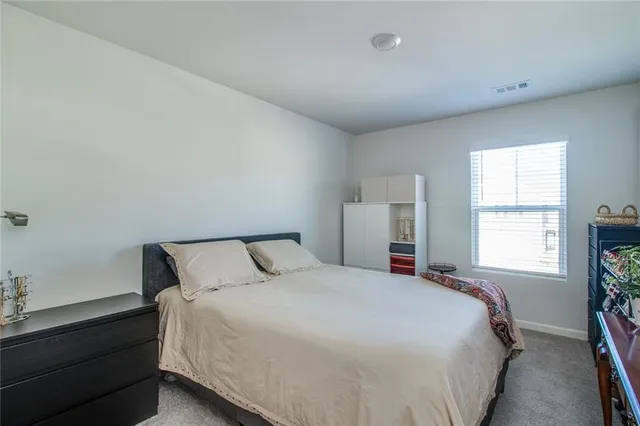 a view of an outdoor sitting area with furniture