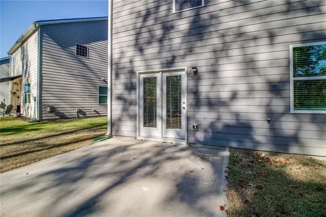 a view of a back yard of the house