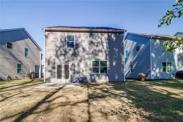 a front view of a house with patio