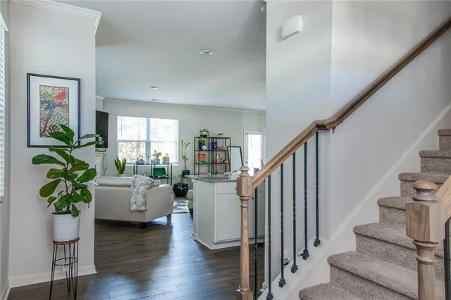 a kitchen with a sink stove and refrigerator