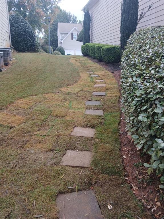 1624 Longmont Drive Lawrenceville, GA 30044 - Photo 2 of 17 a view of a backyard of the house