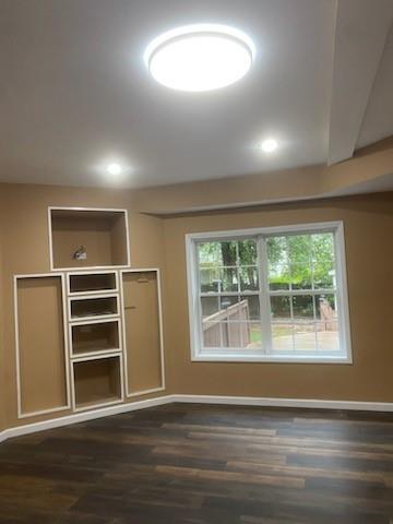 1624 Longmont Drive Lawrenceville, GA 30044 - Photo 9 of 17 a view of an empty room with a window and wooden floor