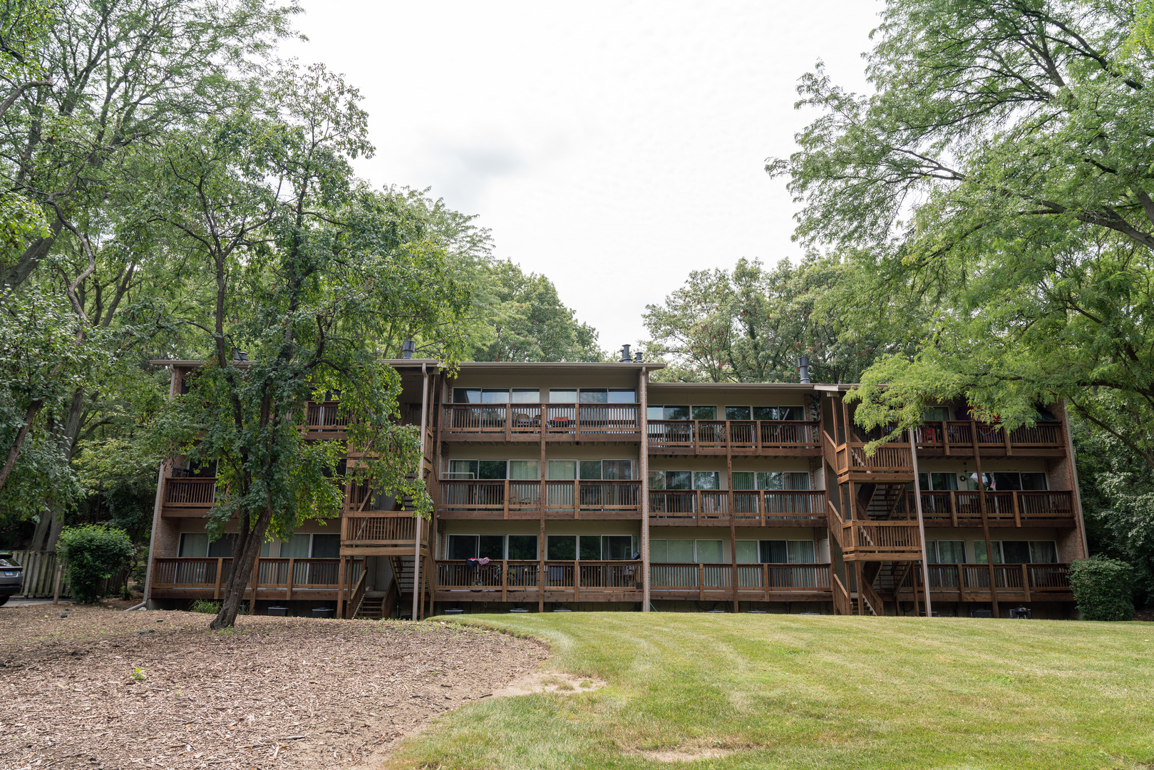 5880 Forest View Road, Unit F Lisle, IL 60532 - Photo 1 of 39 a view of a house with a backyard