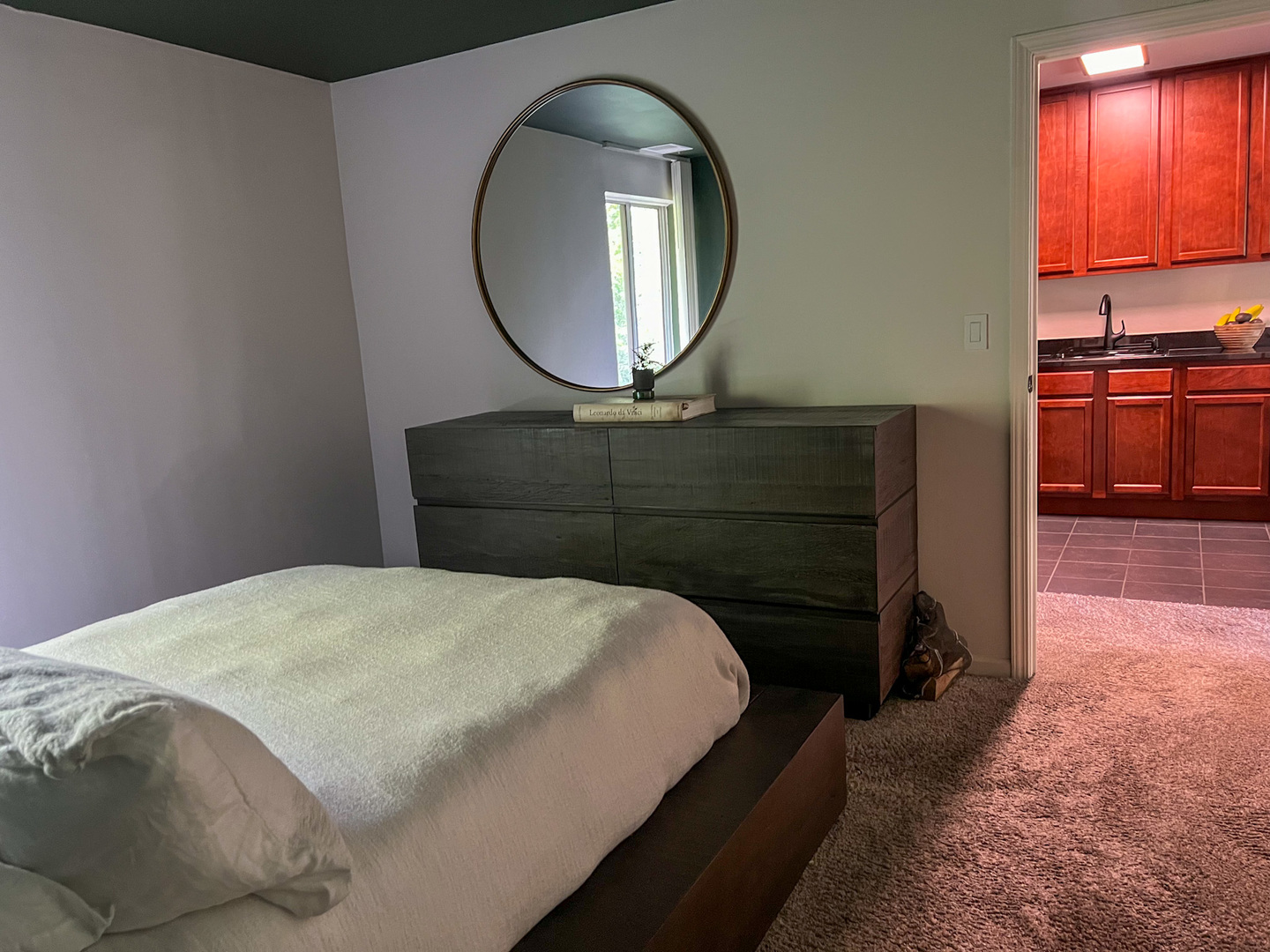 5880 Forest View Road, Unit F Lisle, IL 60532 - Photo 12 of 39 a bedroom with a bed and a mirror on dresser