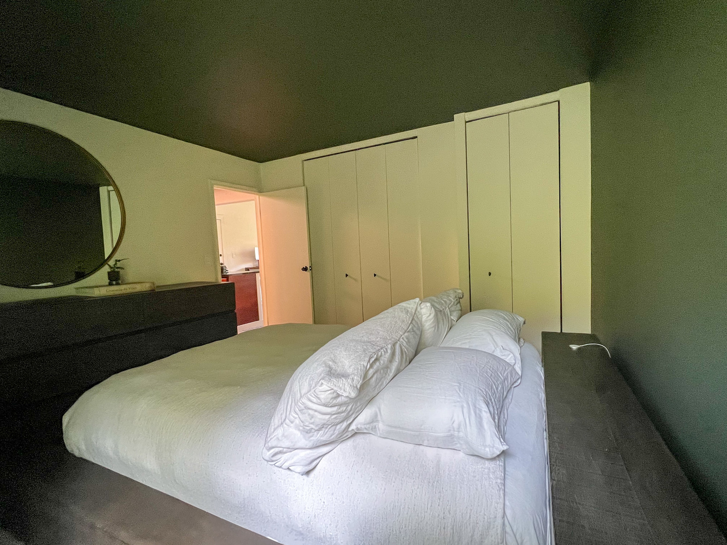 5880 Forest View Road, Unit F Lisle, IL 60532 - Photo 13 of 39 a bedroom with a bed and a mirror