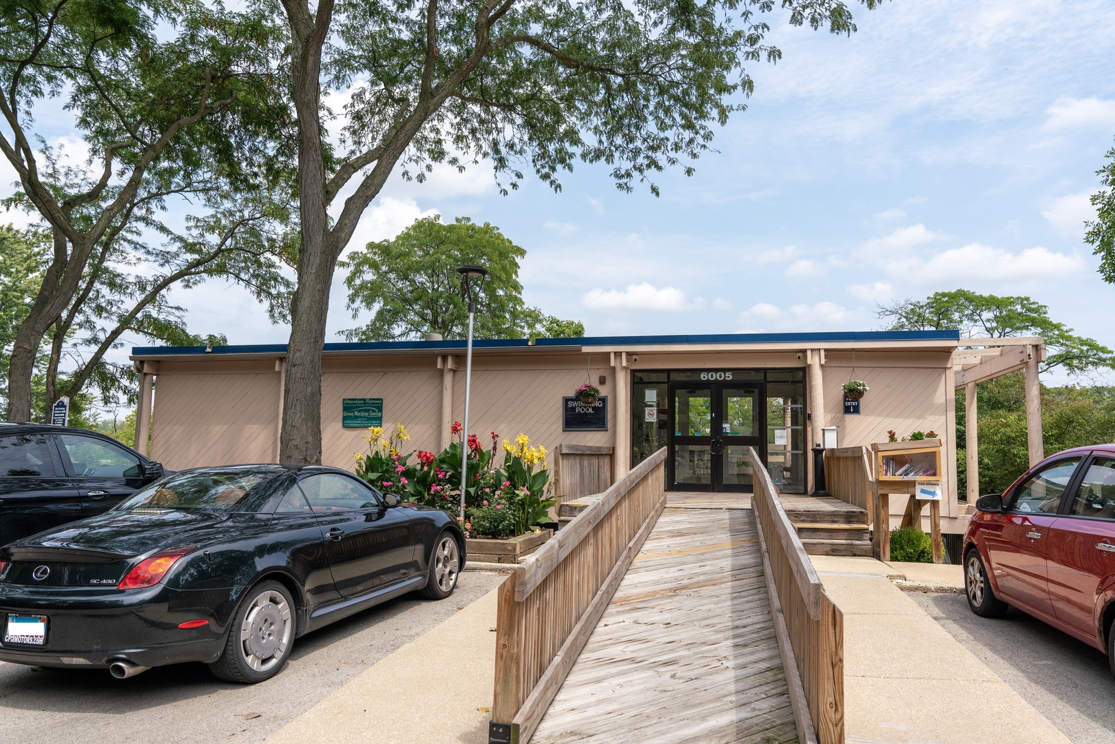 5880 Forest View Road, Unit F Lisle, IL 60532 - Photo 25 of 39 a car parked in front of a house