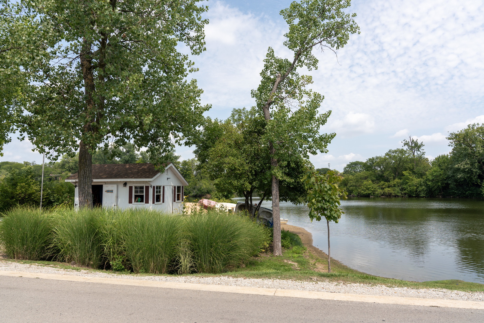5880 Forest View Road, Unit F Lisle, IL 60532 - Photo 36 of 39 a house with river in front of it