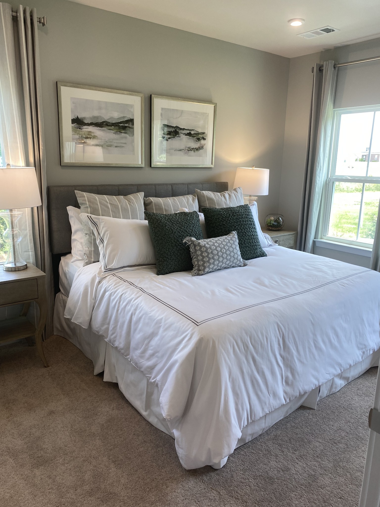 101 Keelon Gap Road, Unit 180D Spring Hill, TN 37174 - Photo 5 of 13 a bed sitting in a bedroom next to a window