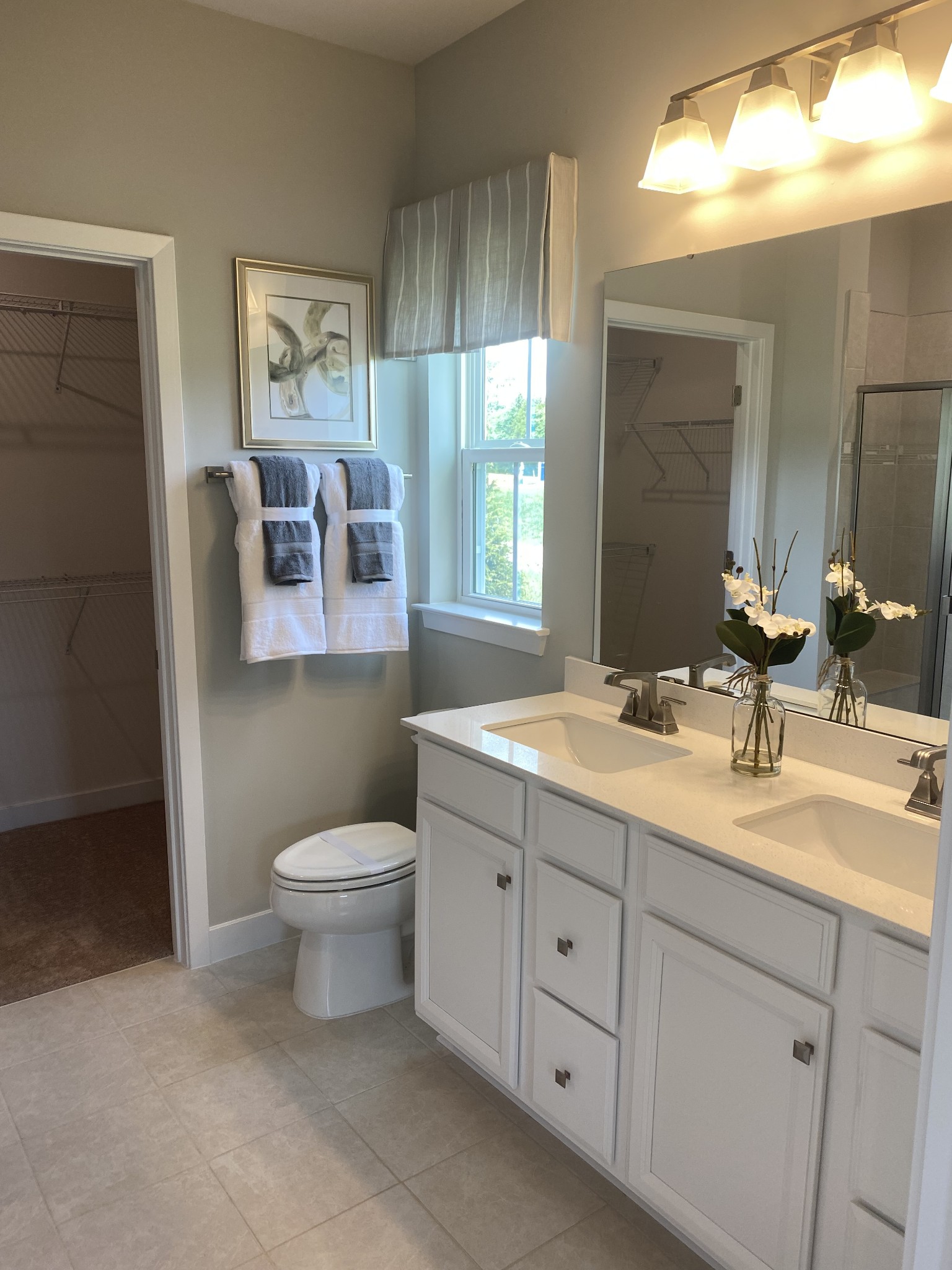 101 Keelon Gap Road, Unit 180D Spring Hill, TN 37174 - Photo 7 of 13 a bathroom with a toilet sink and mirror
