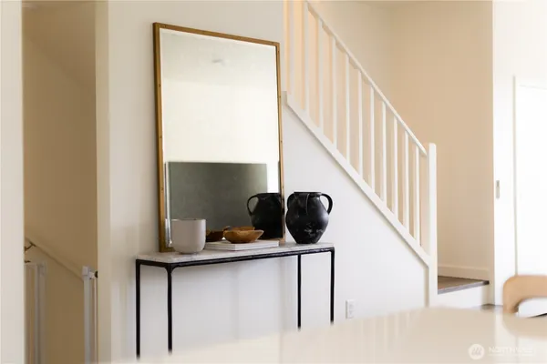 a bathroom with a sink a mirror and shower