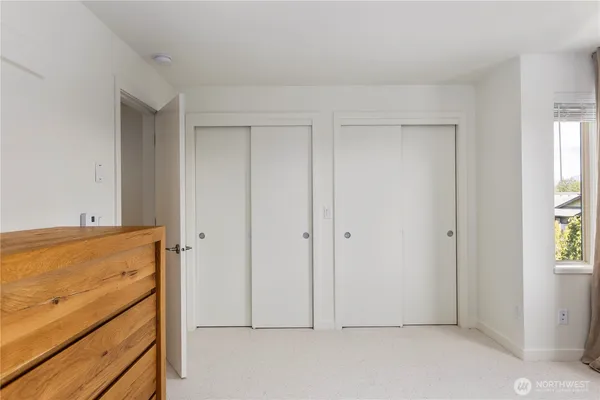 a bathroom with a double vanity sink mirror double and shower