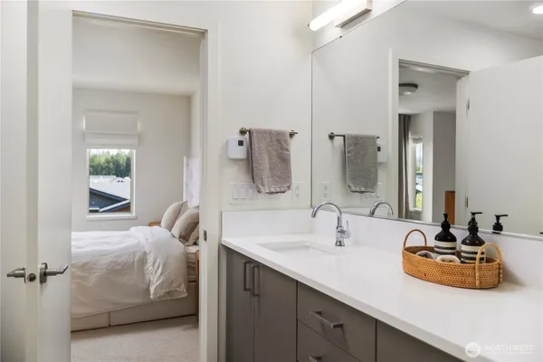 a view of a hallway with washer and dryer