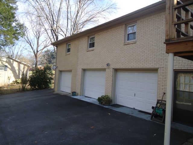 501 Spring Lane Columbia, TN 38401 - Photo 2 of 15 Lots of garage space and plenty of outside parking.