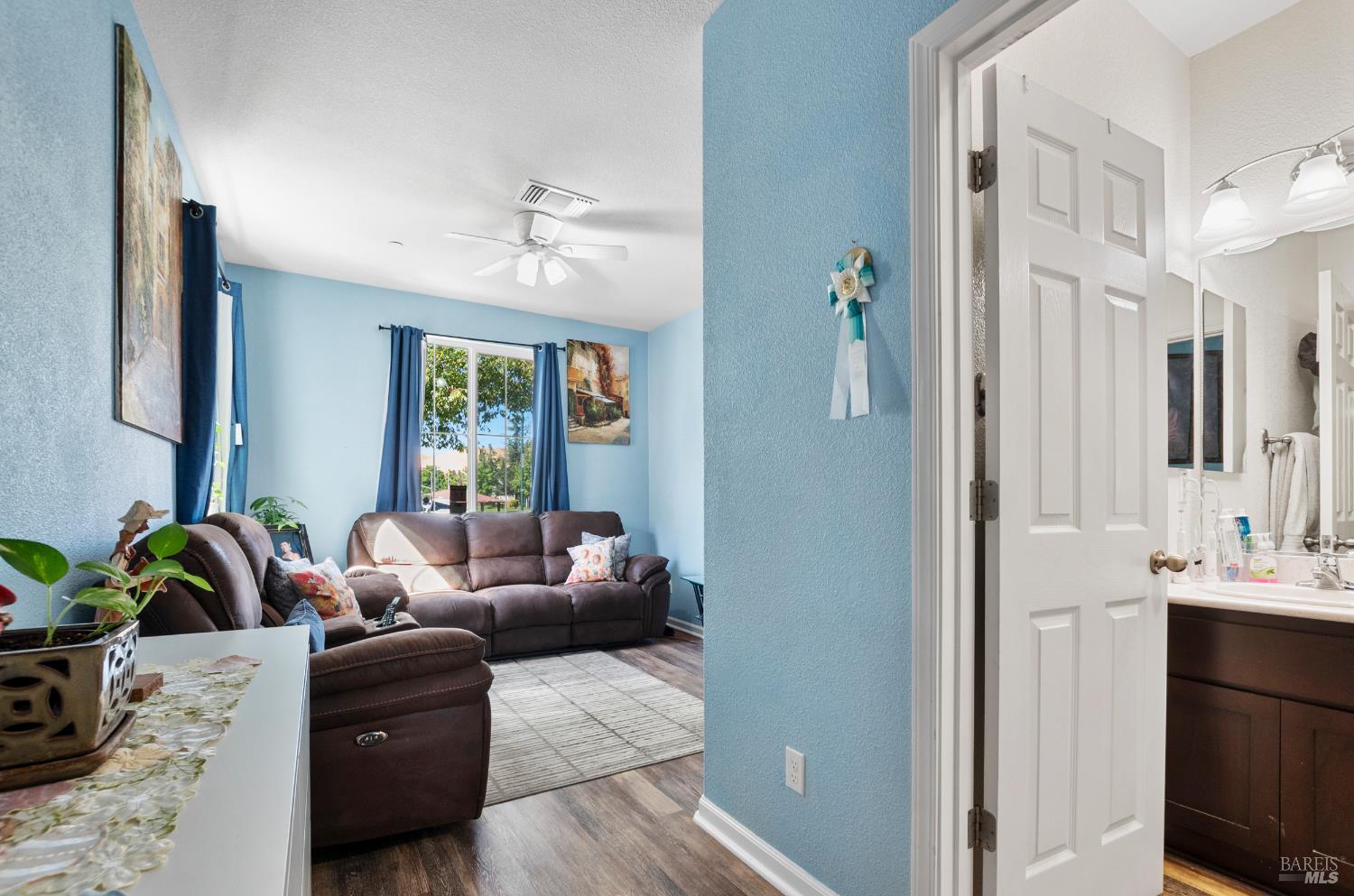 5311 Gramercy Circle Fairfield, CA 94533 - Photo 18 of 43 a living room with furniture and a window
