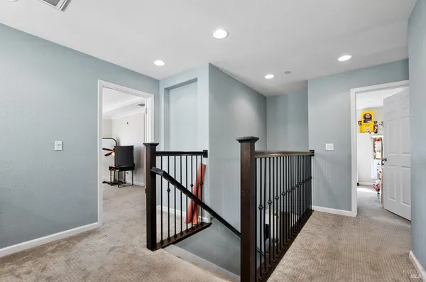 a view of hallway with livingroom