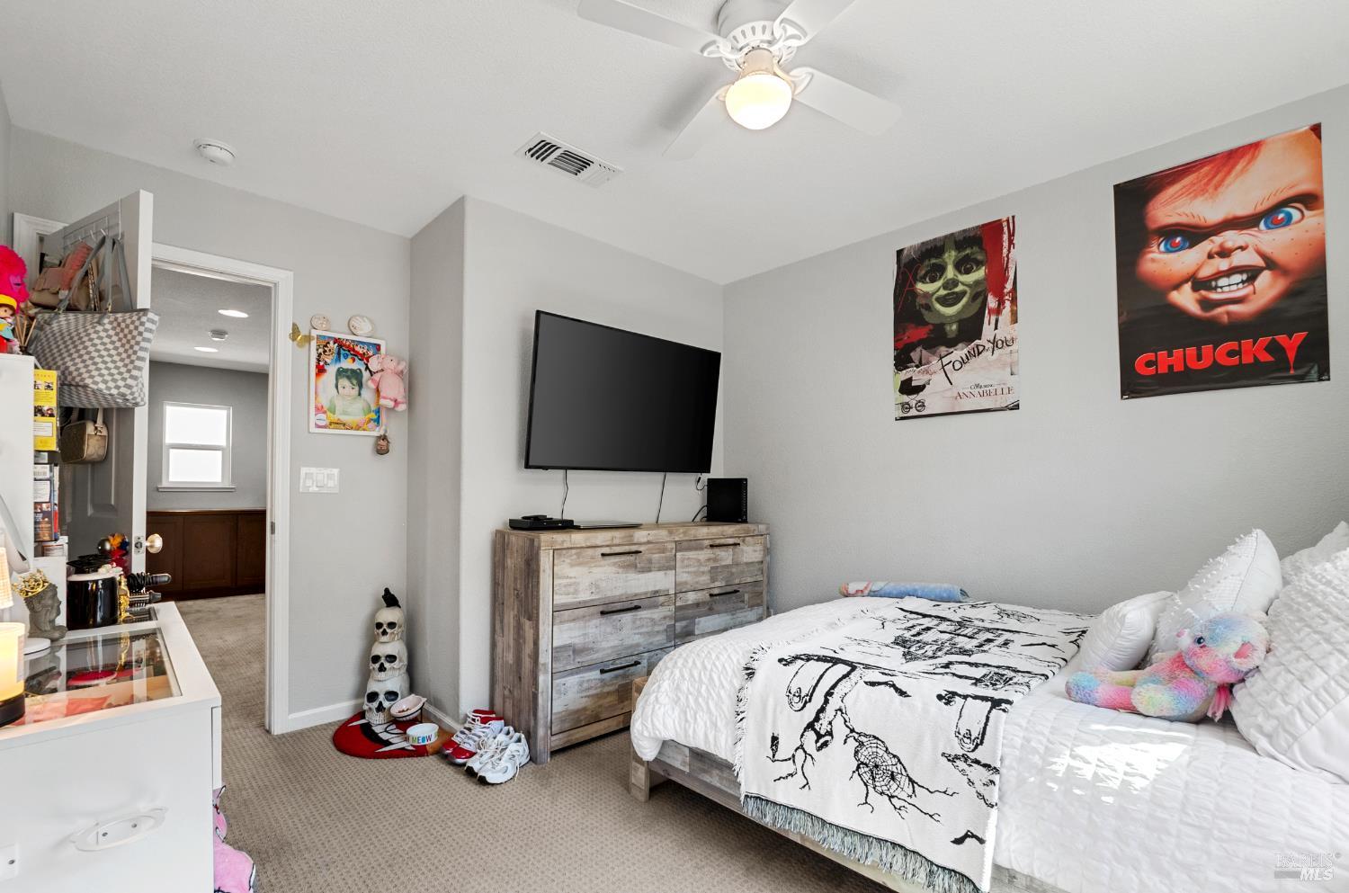 5311 Gramercy Circle Fairfield, CA 94533 - Photo 30 of 43 a bedroom with a bed and a flat screen tv