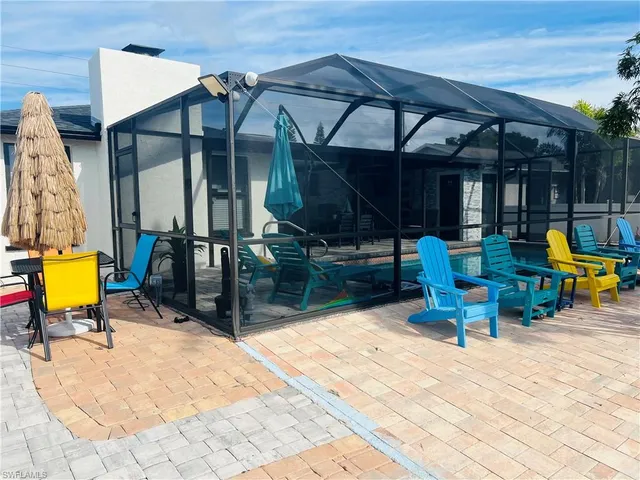 a view of a chairs and tables in patio