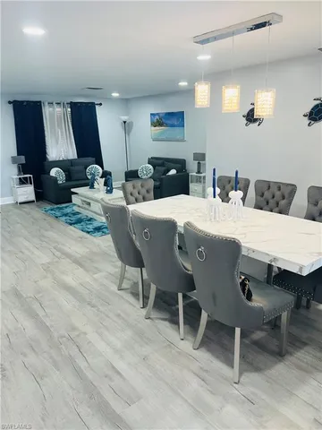 a view of a dining room with furniture