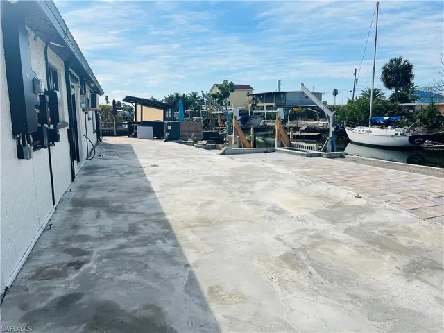 a view of a patio with furniture