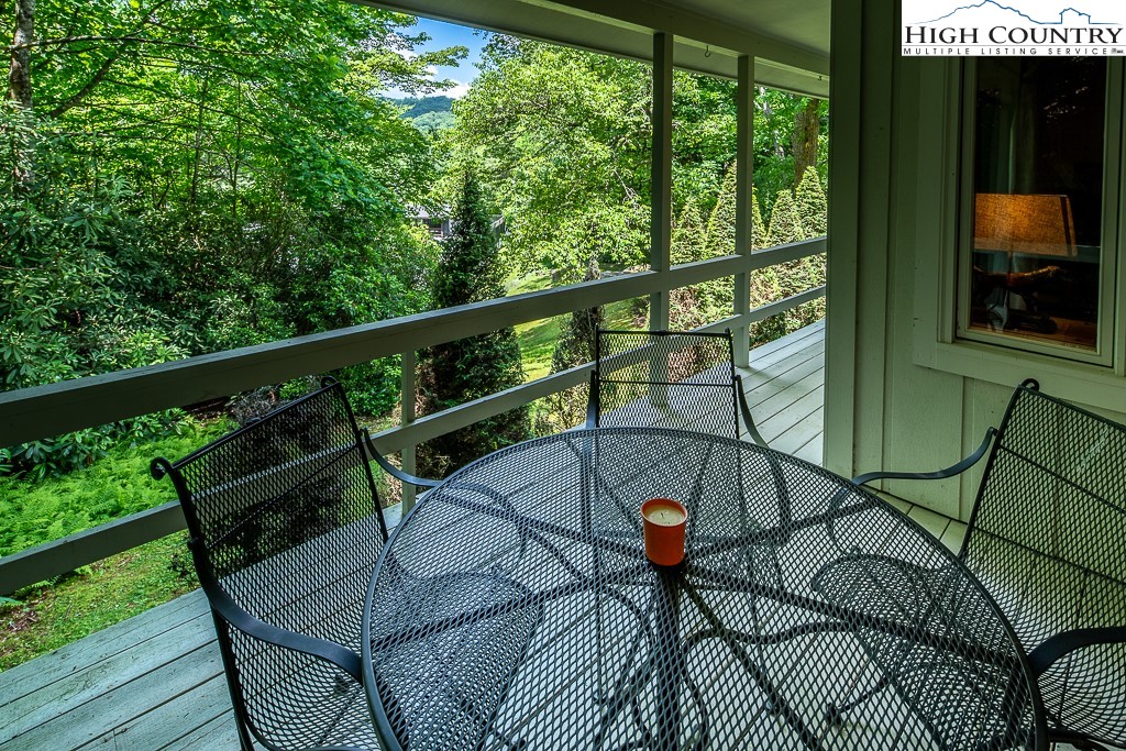 250 Fir, Unit A1 Boone, NC 28607 - Photo 14 of 31 a view of a chairs and table in the balcony