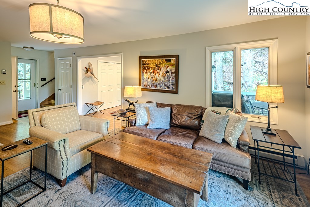 250 Fir, Unit A1 Boone, NC 28607 - Photo 5 of 31 a living room with furniture