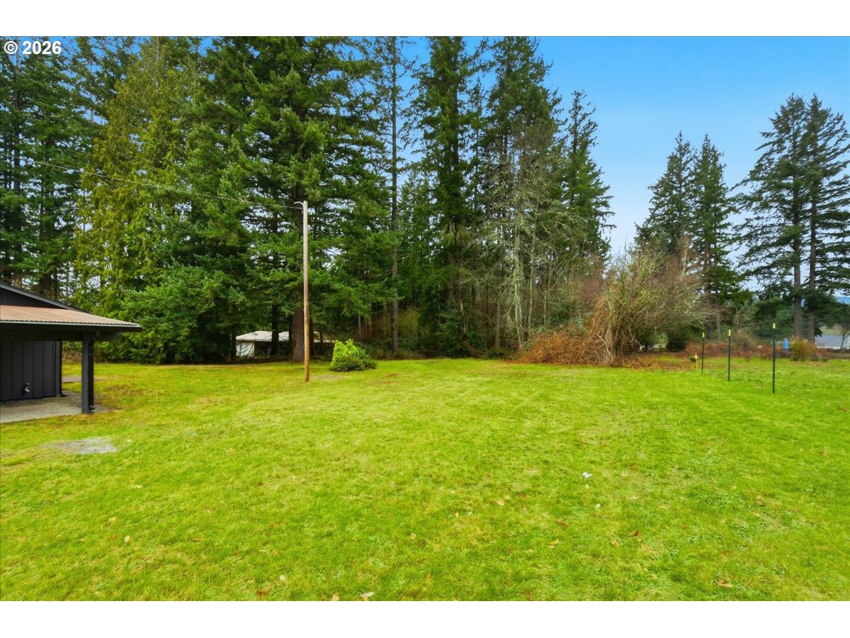 27910 Northeast 28th Street Camas, WA 98607 - Photo 24 of 25 a view of a backyard with a garden
