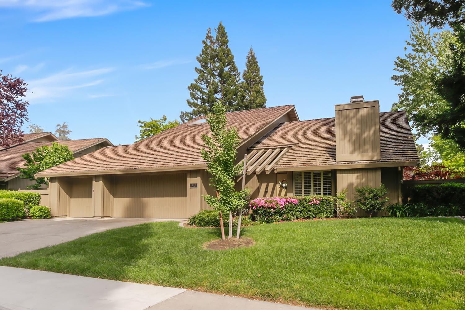 1913 Studebaker Place Gold River, CA 95670 - Photo 1 of 1 a front view of a house with garden