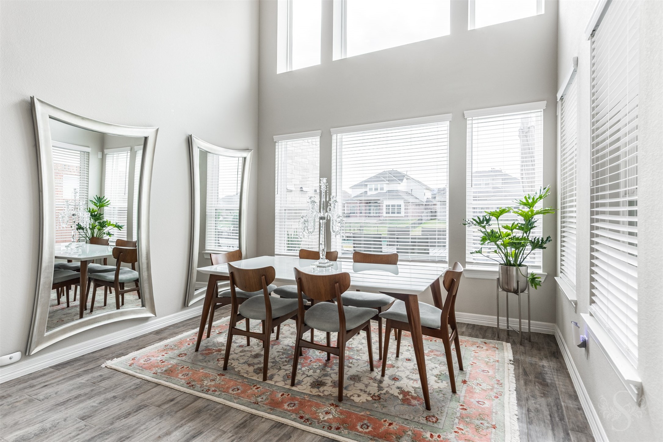 24123 Corinaldo Court Katy, TX 77493 - Photo 17 of 50 a view of a dining room with furniture window and wooden floor