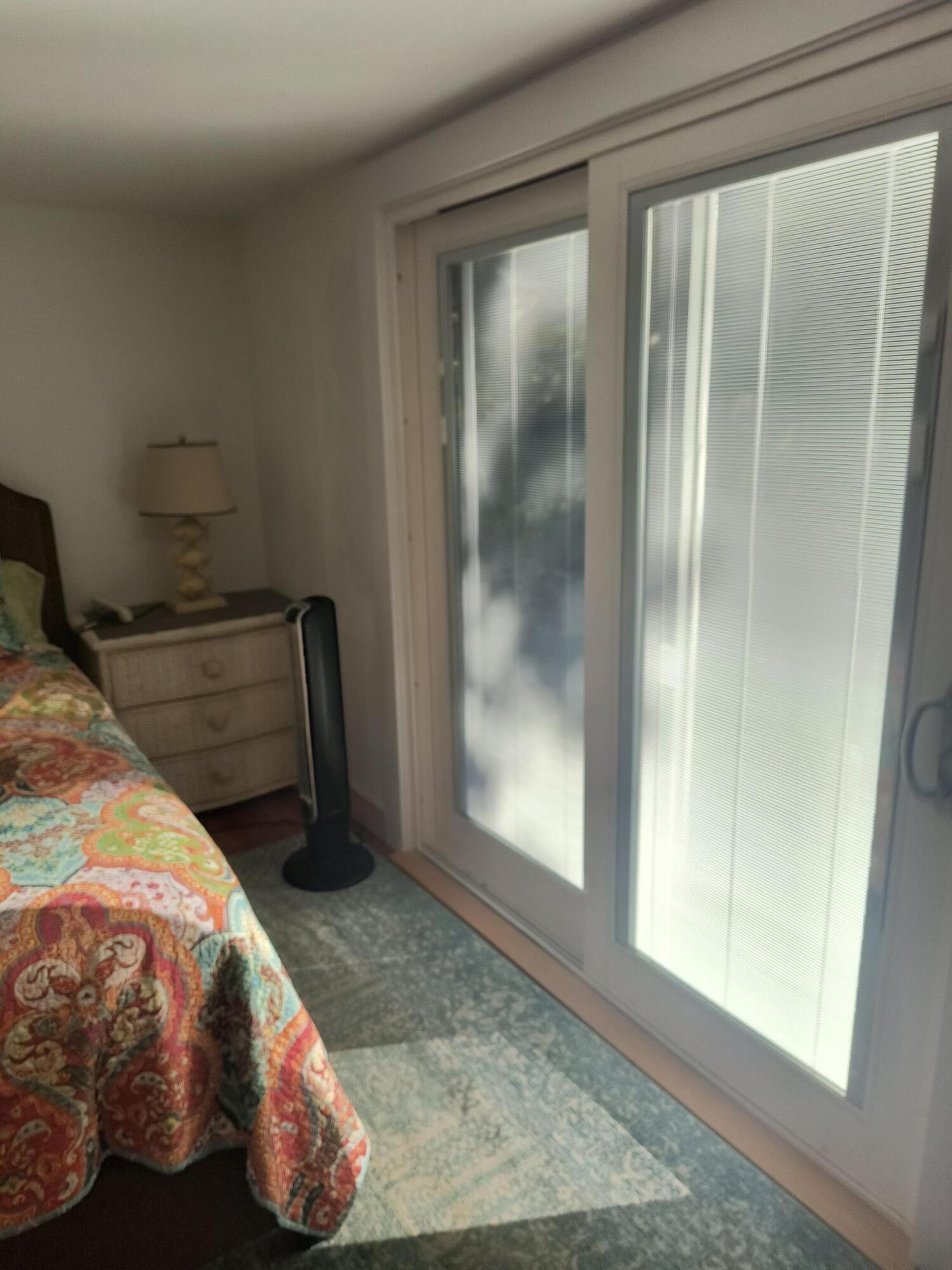 1413 Falmouth Road Centerville, MA 02632 - Photo 23 of 28 a bedroom with a bed and a mirror