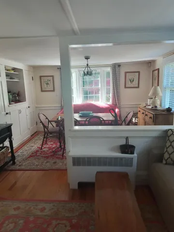 a living room with furniture and window