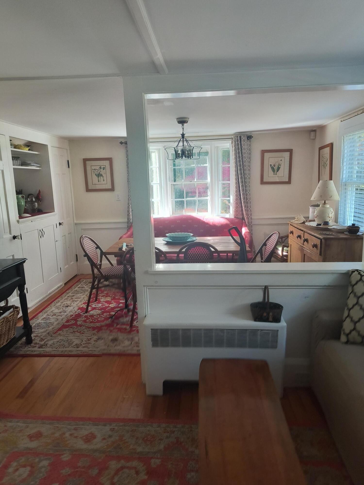 1413 Falmouth Road Centerville, MA 02632 - Photo 4 of 28 a living room with furniture and window