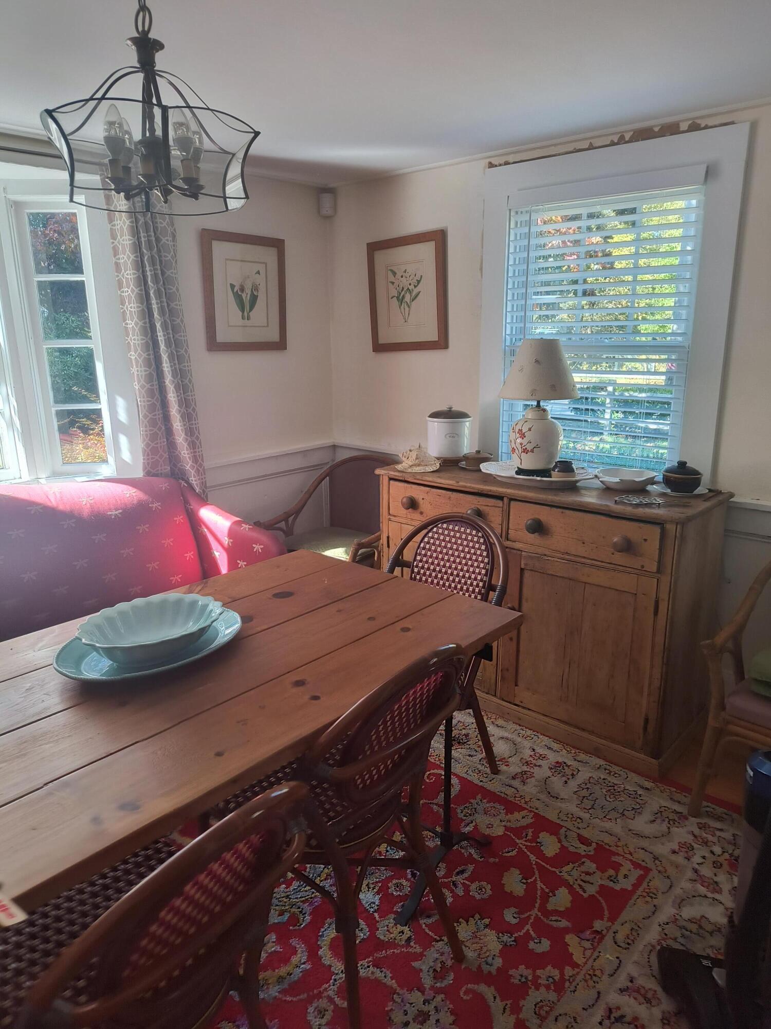1413 Falmouth Road Centerville, MA 02632 - Photo 8 of 28 a view of a dining room with furniture